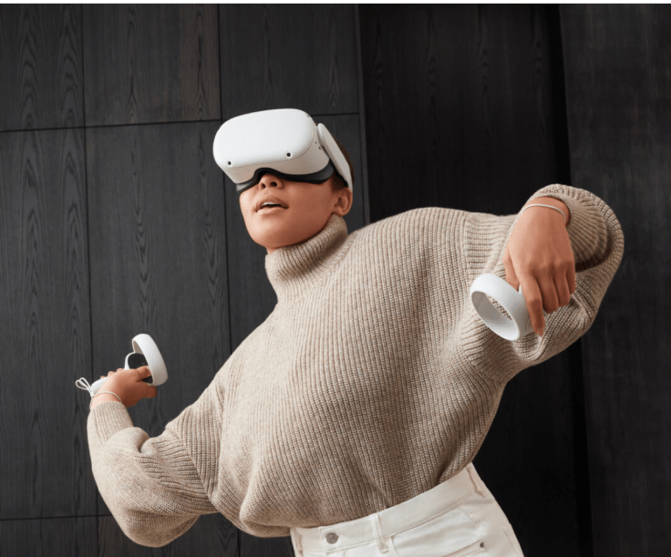 Woman playing in VR wearing Oculus Quest 2